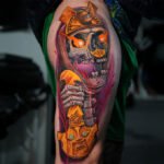 Color realism tattoo inspired by the Lord of Sipán, featuring golden Moche ornaments, skull, and warrior symbolism, created at NOIR Tattoo Studio in Cusco, Peru.