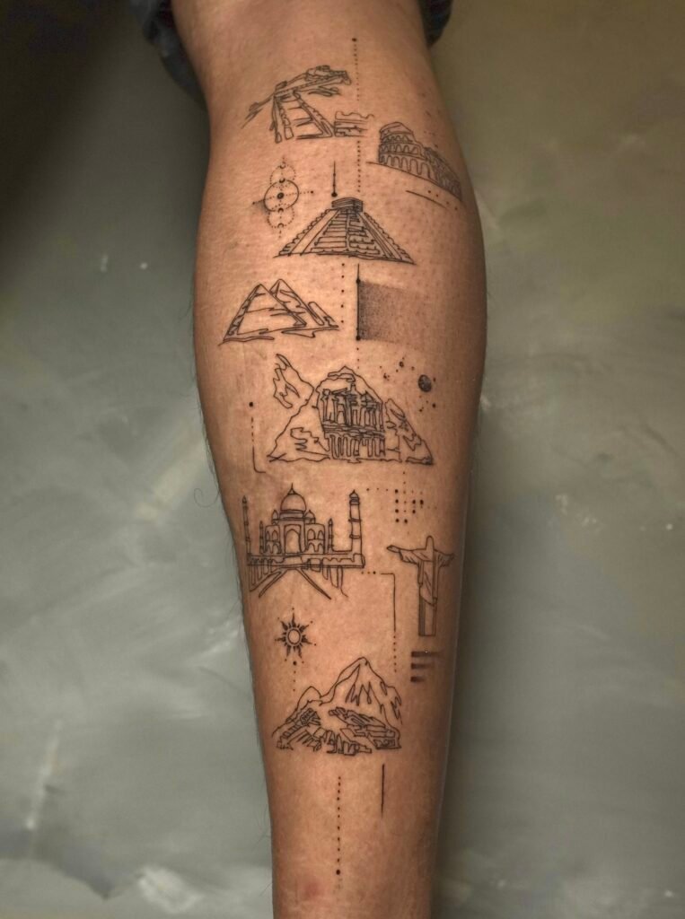 Fine line tattoo featuring the Seven Wonders of the World, including Machu Picchu, the Colosseum, Chichén Itzá, Christ the Redeemer, the Great Pyramid of Giza, and more, created at NOIR Tattoo Studio in Cusco, Peru.